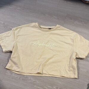 Alphalete Yellow Cropped T-Shirt